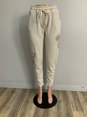 Pe26,110janv Pantalon beige avec Mickey sur les côtés en paillettes taille unique