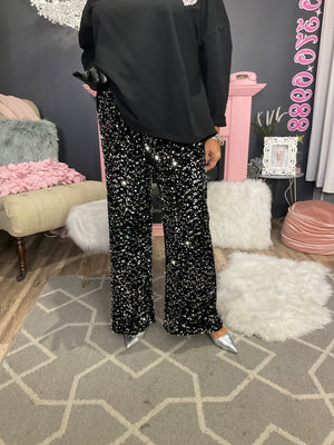 Ah25,131oct pantalon à paillettes noir et argent Angela Mara