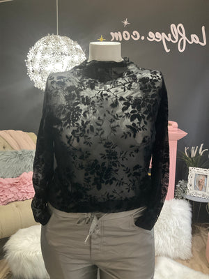 Ah25,23oct Haut noir ajusté  au corps transparent avec fleurs en velour