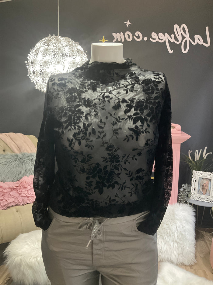 Ah25,23oct Haut noir ajusté  au corps transparent avec fleurs en velour