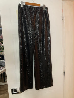 Ah25,131dec  Pantalon noir avec paillettes