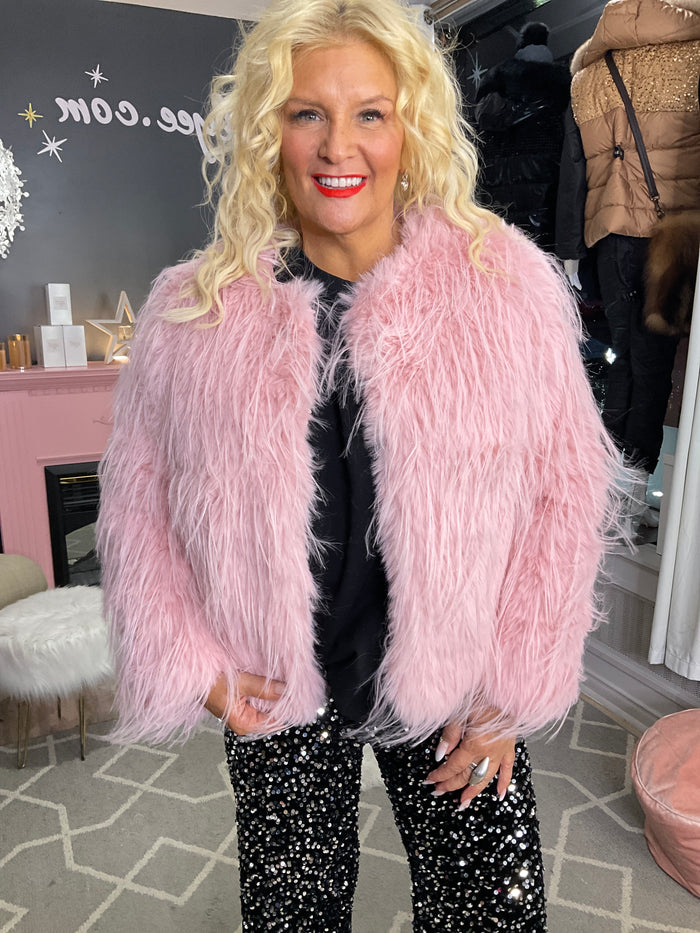 Ah25,330oct. Manteau rose en fourrure synthétique court