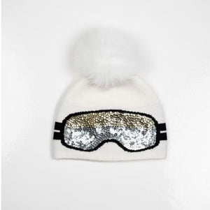 MMC204 BONNET BLANC ET NOIR À LUNETTES EN SEQUINS AVEC POMPON EN RENARD HTA159