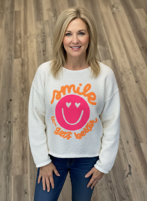 Pe26,21janv Haut blanc cassé avec bonhomme sourire avec écriture taille unique 46 pouces de buste