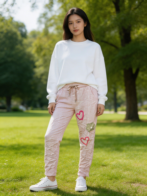 Pe26,151fev pantalon rose avec cœur et marguerite