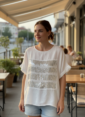 Pe26,42mars Haut blanc avec paillettes