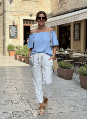 Pe25,101juin Pantalon blanc avec paillettes